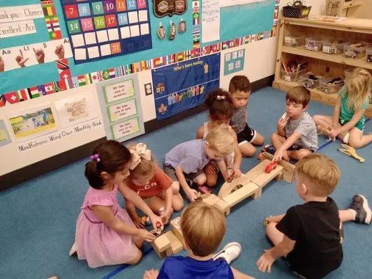 kids in classroom on educational rug