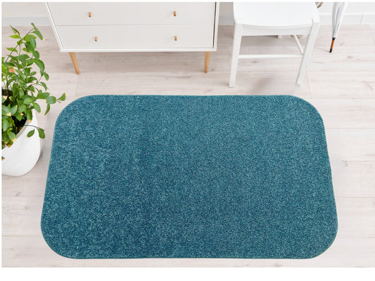 Mermaid Teal Area Rug with chair and wardrobe