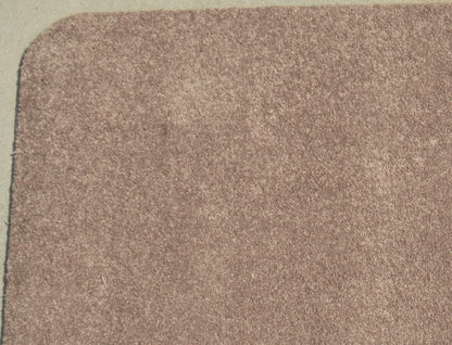 Winter Brown Area Rug on tile floor with chair