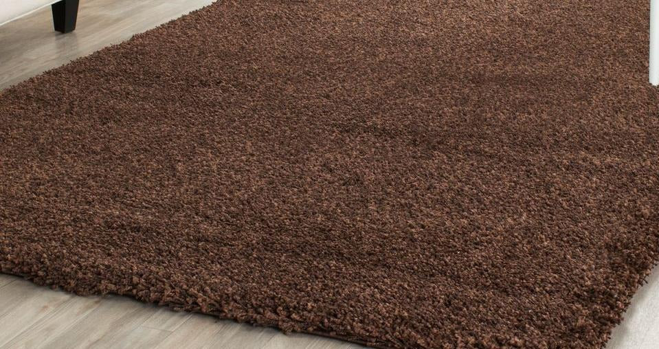 Dark Chocolate Brown Area Rug on hardwood floor
