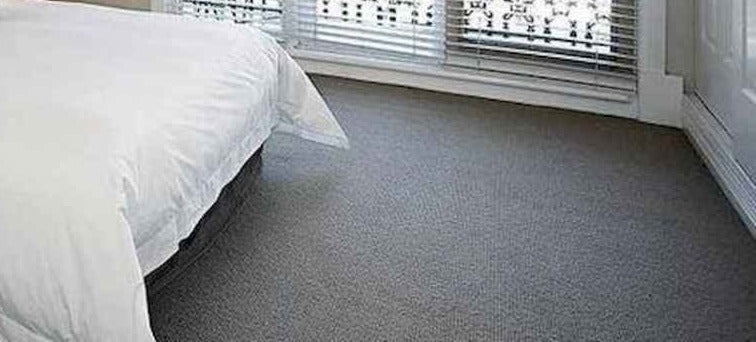 Concrete Grey Area Rug in bedroom