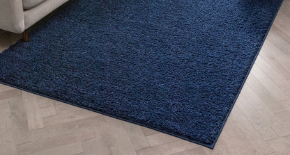Darkest Navy Blue Area Rug with couch
