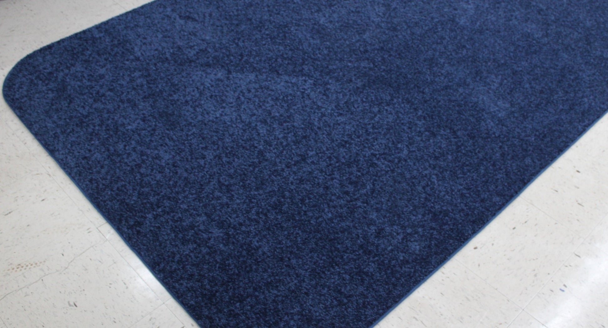 Darkest Navy Blue Area Rug on tile floor